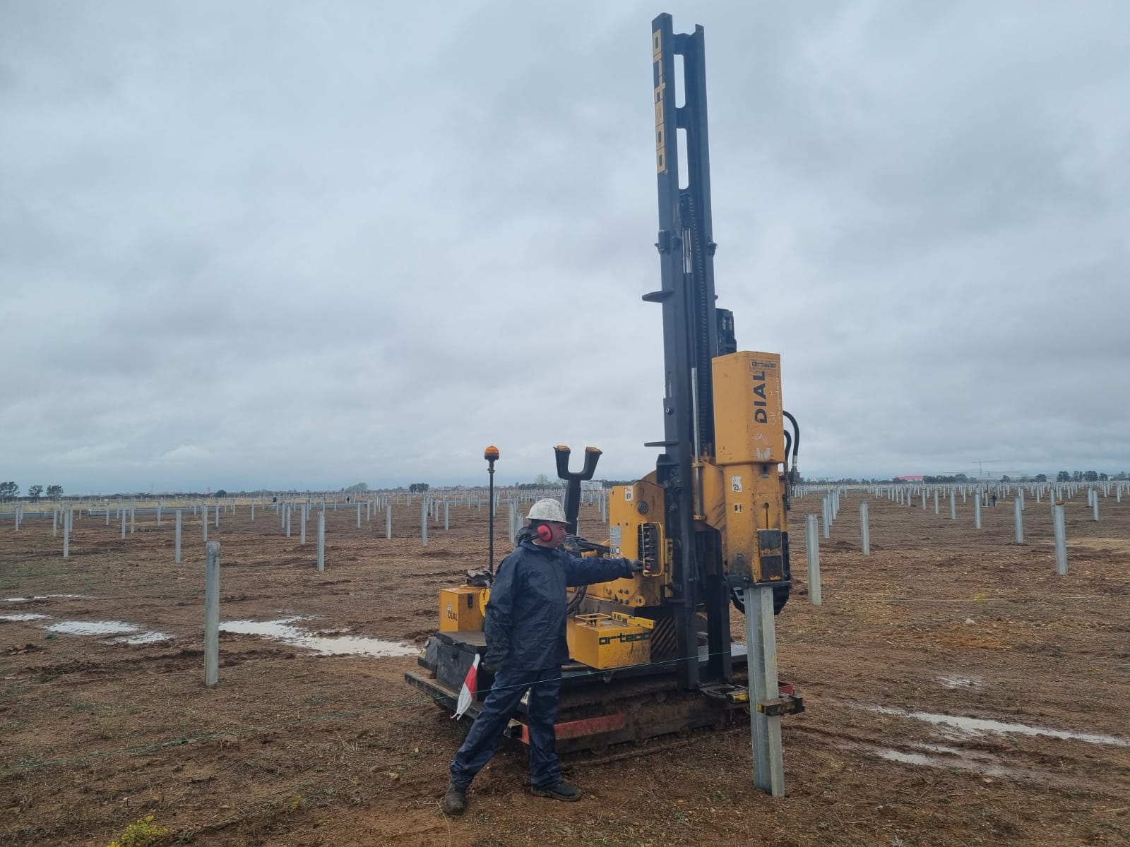 ORTECO hydraulic pile driver installing steel foundations for a utility-scale solar PV project